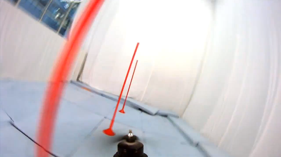 First person view of the quadrocopter racing through a pylon slalom course.