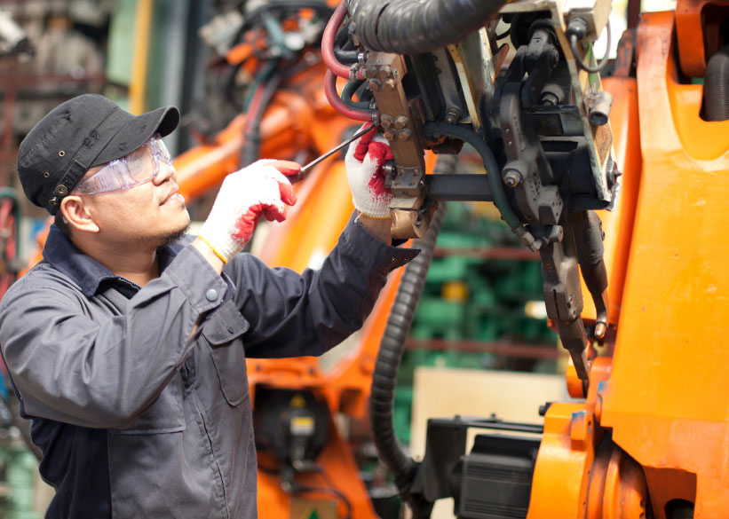 technician_repairing_industrial_robot