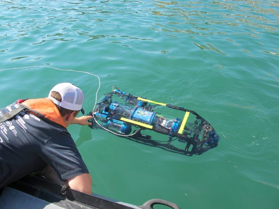 Team participating in SAUC-E sea robotics competition collects their robot from the sea. Photo credits: SAUC-E