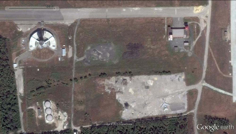 This satellite photo of the southwestern corner of the airport, also dated Sept. 2, 2014, shows some damage already had occurred to the air traffic control tower. The plane in the lower right of the image, most likely a Tupolev TU-134 transport, is intact but had been left in the same spot for months. It would be another three days before the cease-fire was signed.