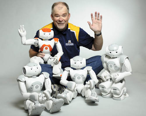 Hunter Lloyd with his Nao robots