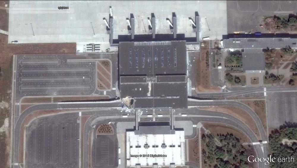 Google Earth satellite imagery recorded on Sept. 2, 2014. Note existing damage to the southwest corner of the main terminal.
