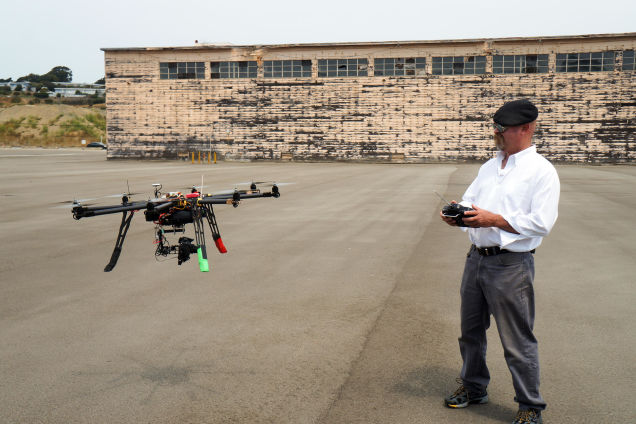 Mythbusters co-host Jaime Hyneman test flies a drone. Credit: DLC. Via: io9