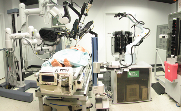 The SRI-led Trauma Pod, developed for DARPA as a next-generation mobile robotic surgery platform for the military. Credit: SRI International via Wikimedia Commons