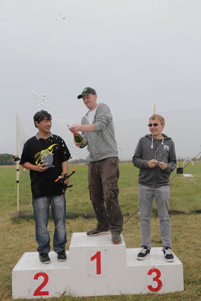 Finalists on the podium - 1st place - James Bowles aka Jab1a, 2nd place - Chi Lau and 3rd - Scott Collis. Photo credit: David Stock.