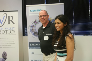 Rich Mahoney, Director of Robotics SRI International (and Robot Launch judge) presenting award to runner up, Pree Wallia, CEO & Founder of Preemadonna, inventors of the NailBot.