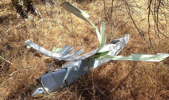 A reconnaissance drone shot down by Turkey on the border with Syria. Image via AP.