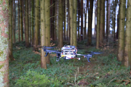 Photo of quadrotor navigating in the forest