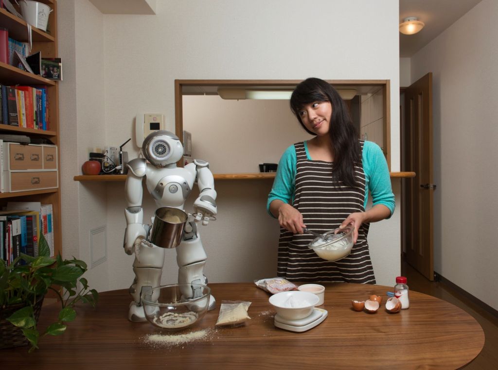 Lim with robot. Image credit: Irwin Wong