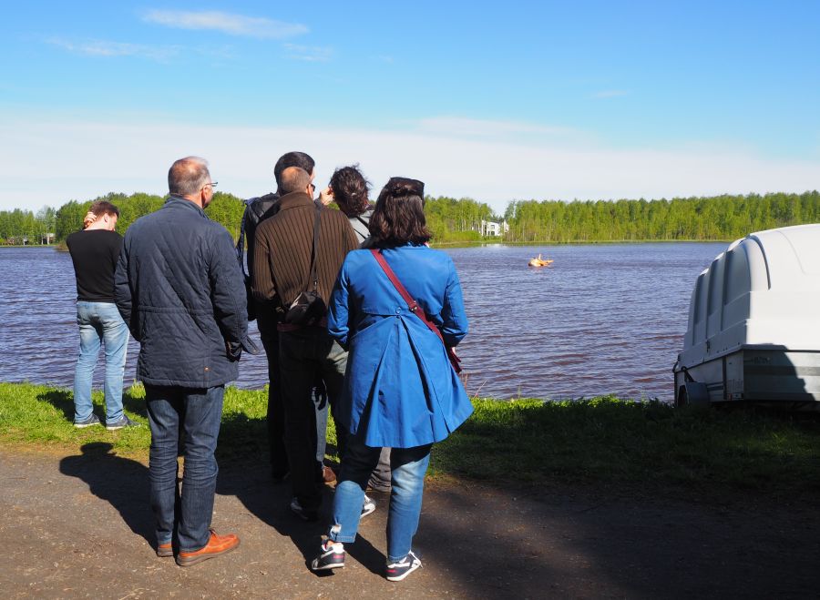 Participants of euRathlon/SHERPA 2015 summer school test the USV on the lake in Oulu.  Photo credits: euRathlon