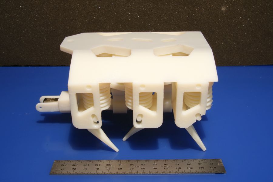 This 3-D hexapod robot moves via a single motor, which spins a crankshaft that pumps fluid to the robot’s legs. Besides the motor and battery, every component is printed in a single step with no assembly required. Among the robot’s key parts are several sets of “bellows” 3-D printed directly into its body. To propel the robot, the bellows uses fluid pressure that is translated into a mechanical force. (As an alternative to the bellows, the team also demonstrated they could 3-D print a gear pump that can produce continuous fluid flow.) Photo: Robert MacCurdy/MIT CSAIL