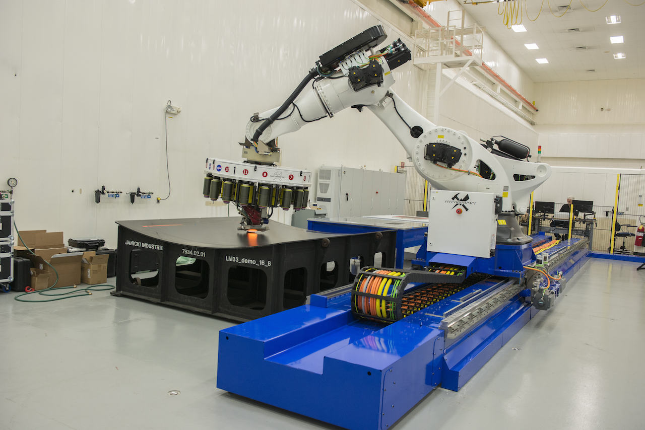 Robot weaving carbon fiber into rocket parts. Source: NASA/YouTube