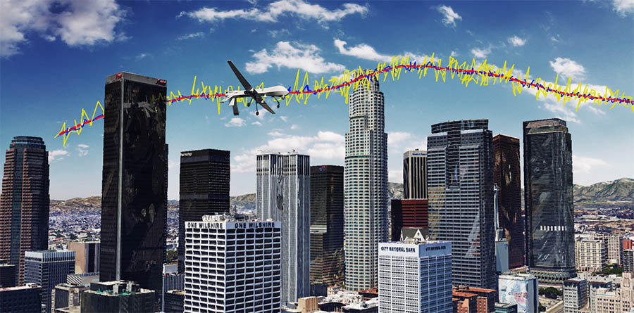 Simulation results for a unmanned drone flying over downtown Los Angeles showing the true trajectory (red line), from GPS only (yellow line), and GPS aided with cellular signals (blue line). Image: ASPIN Laboratory at UC Riverside