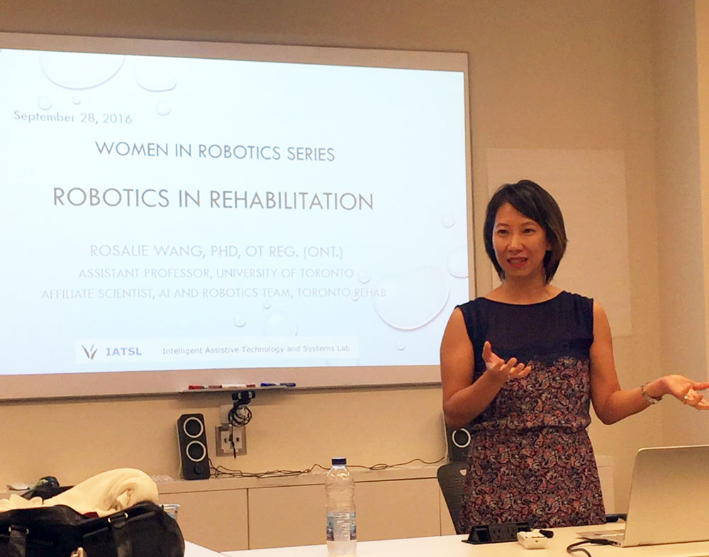 Rosalie Wang speaks about her career path from Occupational Therapist to rehab robotics researcher at the Women in Robotics lecture series, hosted by Get Your Bot On and Women Engineers TO in Toronto, Canada. Photo via Nicole Proulx at Women Engineers TO.