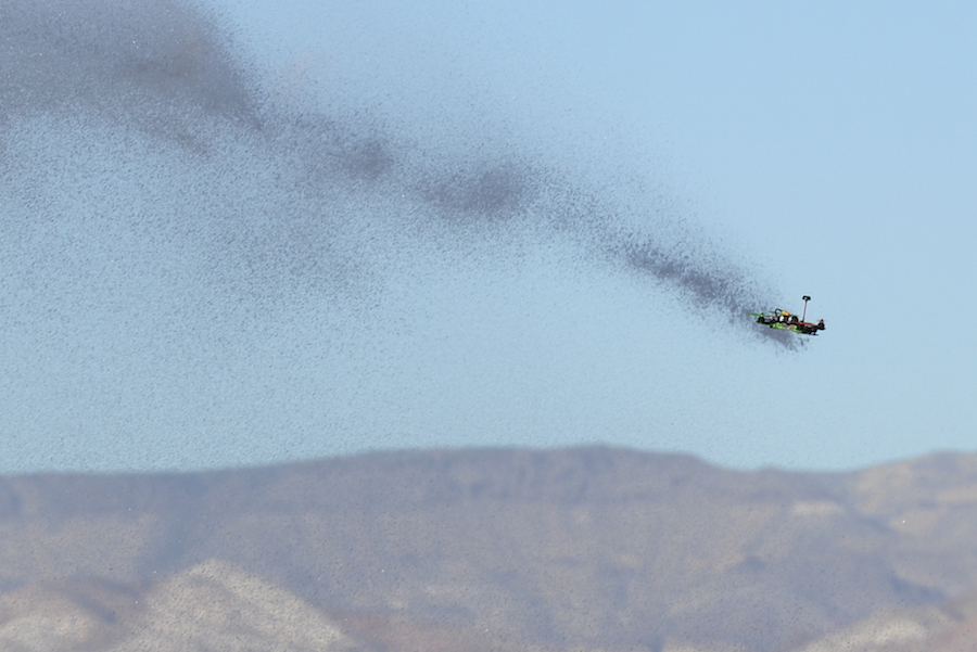 An Immersion Vortex 250 drone collides with the end of the spray from a water cannon, part of the counter-unmanned aerial system solution developed by the team from Robins Air Force Base, Ga., during the 2016 Air Force Research Laboratory Commanders Challenge at the Nevada National Security Site, Las Vegas, NV., Dec. 13, 2016. Teams were given six months to develop a complete counter unmanned aerial system to aid in base defense. Robins' system is a multi-layered integrated system which uses a radar and camera system for detection and identification. It also uses a hunter killer drone for interception and a water cannon for shooting it out of the sky. (U.S. Air Force photo by Wesley Farnsworth)