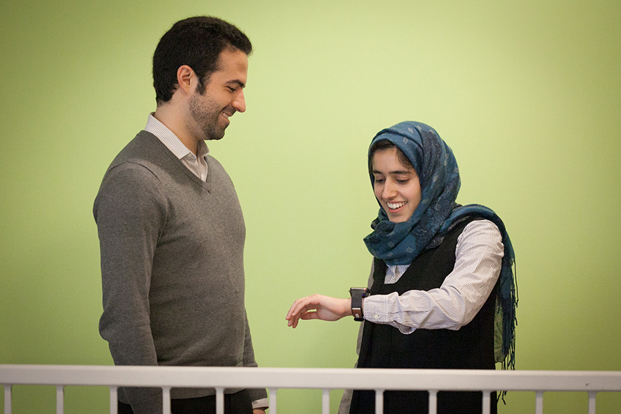 Mohammad Ghassemi and Tuka Alhanai converse with the wearable. Image: Jason Dorfman MIT CSAIL
