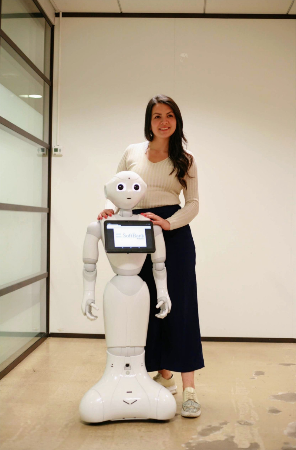 Natalia Calvo with Pepper robot